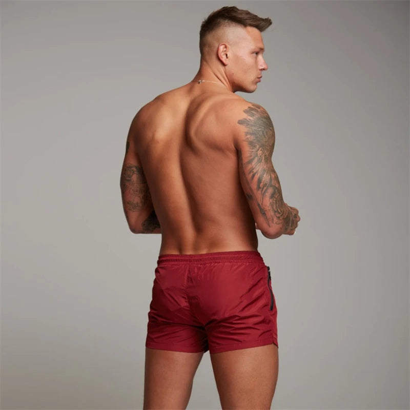 Pantaloncini da bagno con tasche a zip